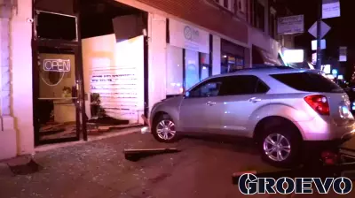 Driver Injured After Car Crashes into North Side Business