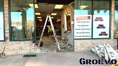 Vehicle Collides with Building in Plymouth Shopping Plaza